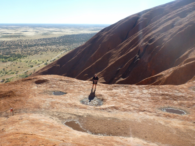 on the way up climbing Uluru